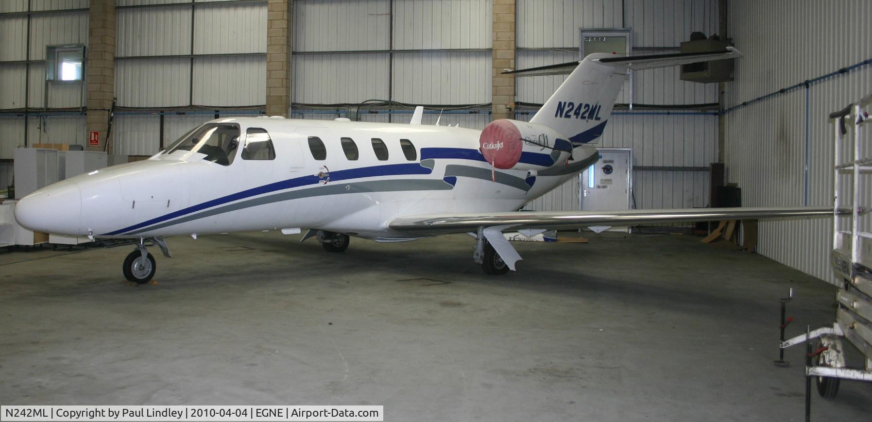 N242ML, 2003 Cessna 525 CitationJet CJ1 C/N 525-0506, nice clean hanger !