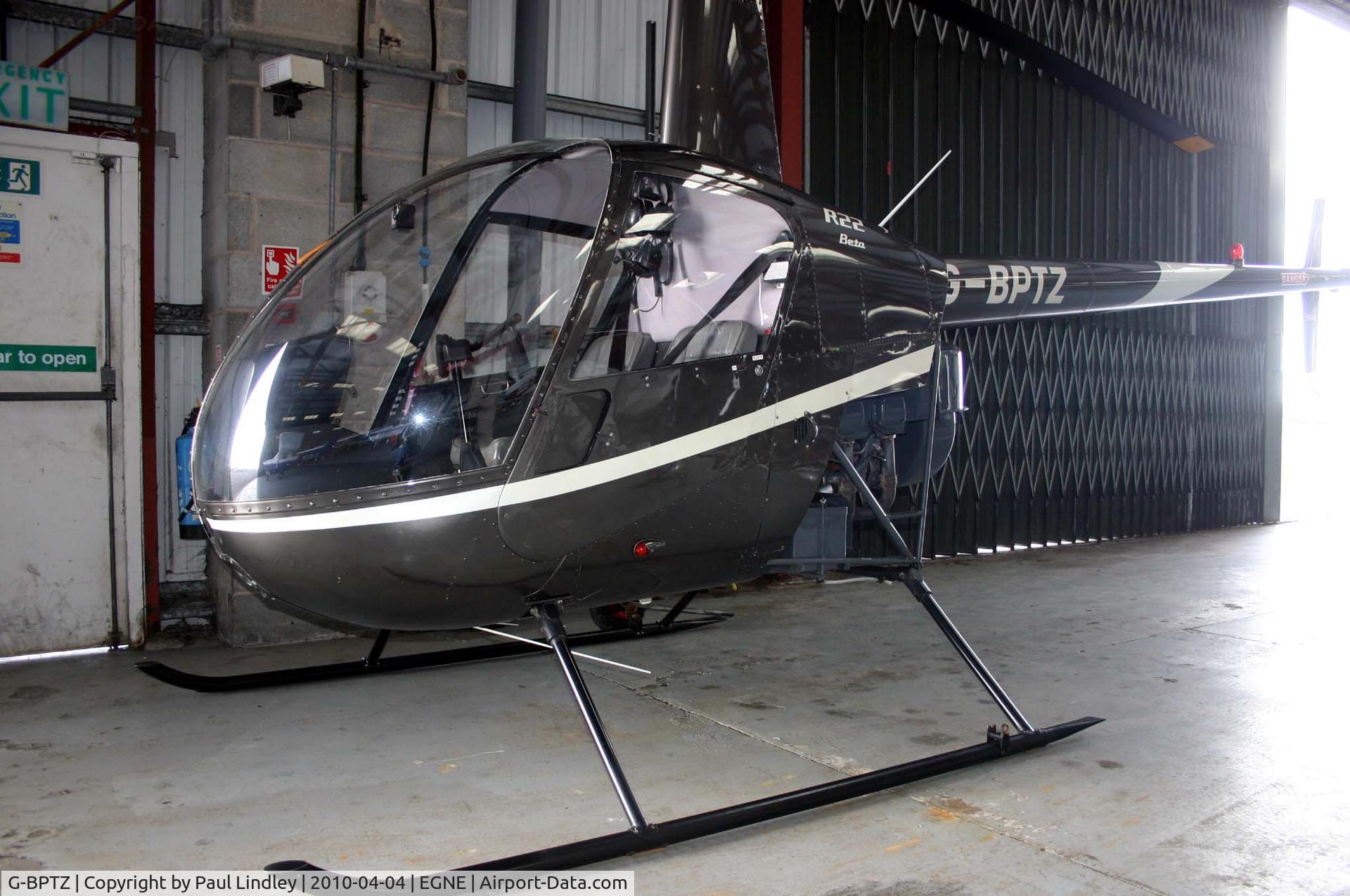 G-BPTZ, 1989 Robinson R22 Beta C/N 0958, under cover