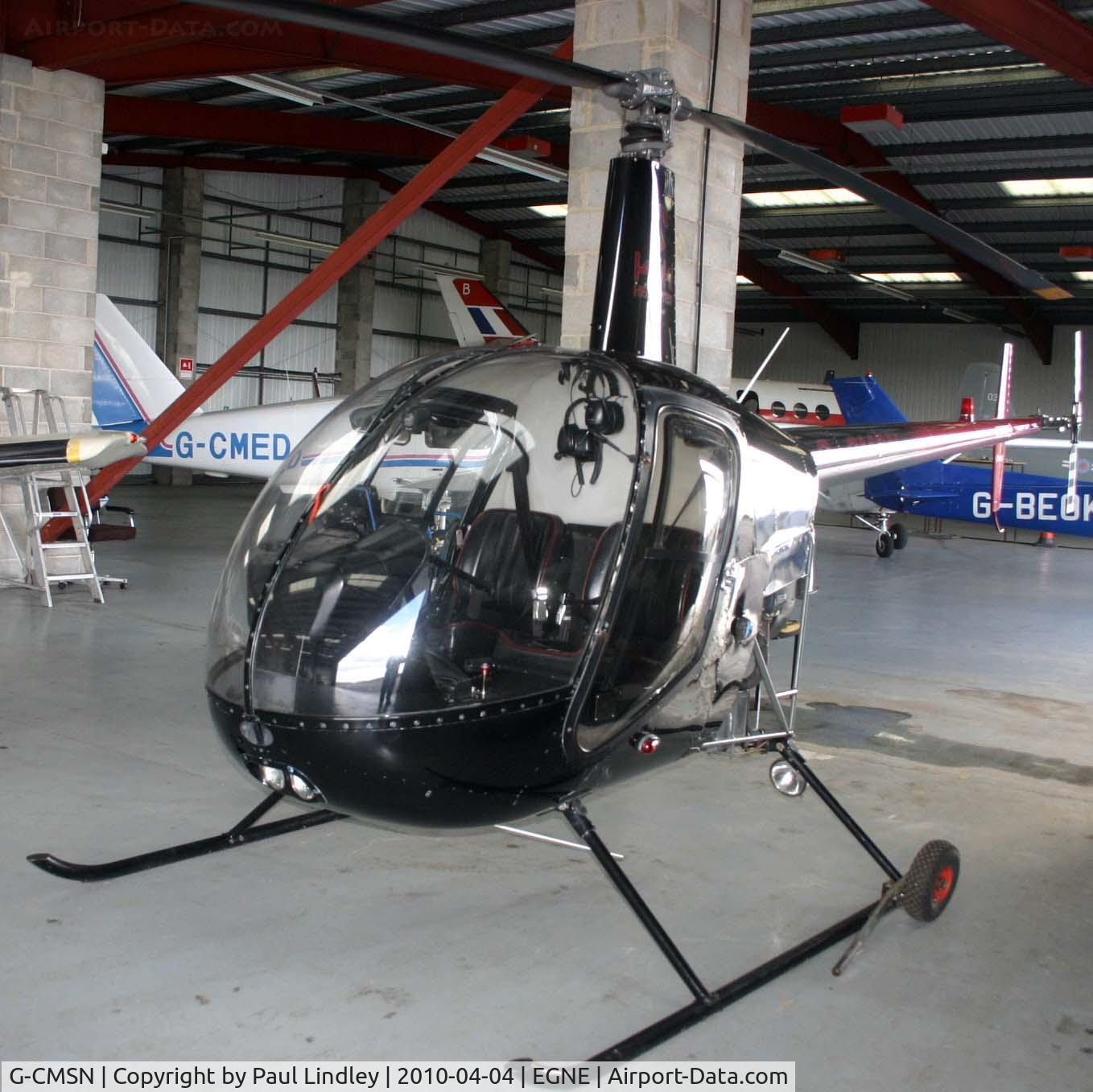 G-CMSN, 1991 Robinson R22 Beta C/N 1669, under cover