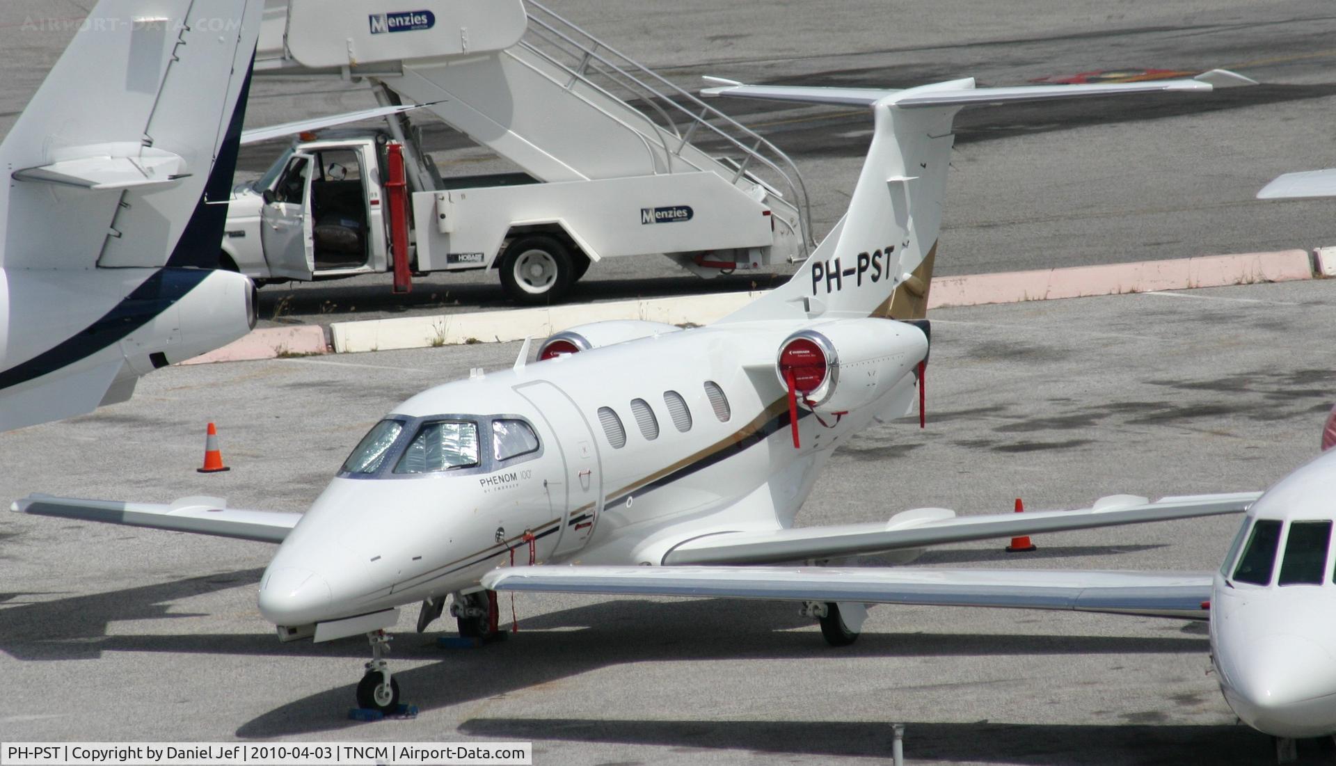 PH-PST, 2010 Embraer EMB-500 Phenom 100 C/N 50000132, PH-PST park at the main ramp at TNCM