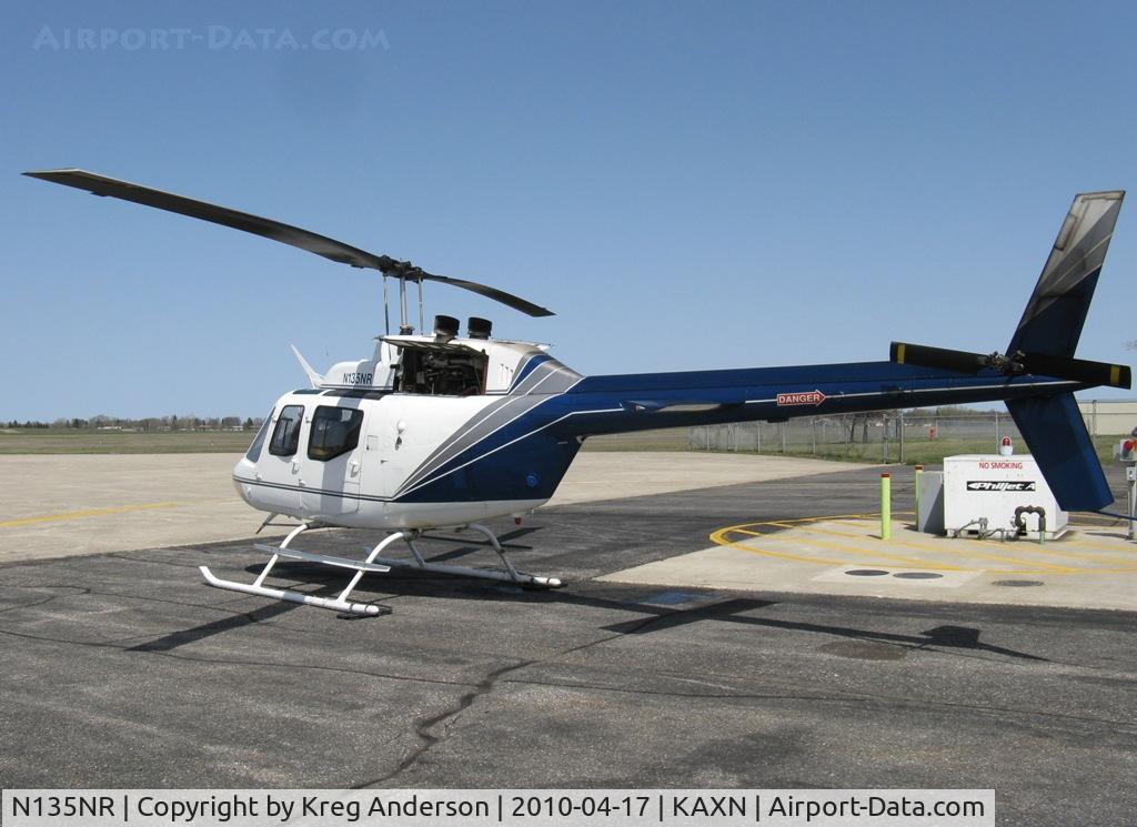 N135NR, 1968 Bell OH-58C Kiowa C/N 40216, Minnesota Department of Natural Resources helicopter stopping for fuel.