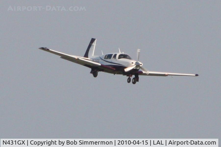 N431GX, 2006 Mooney M20R Ovation C/N 29-0431, Arriving at Lakeland, FL during Sun N Fun 2010.