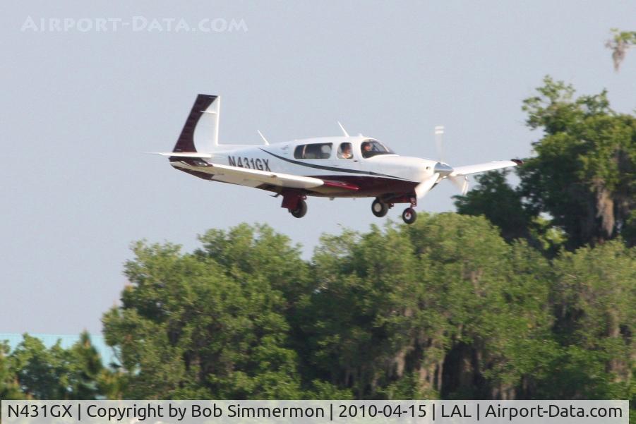 N431GX, 2006 Mooney M20R Ovation C/N 29-0431, Arriving at Lakeland, FL during Sun N Fun 2010.