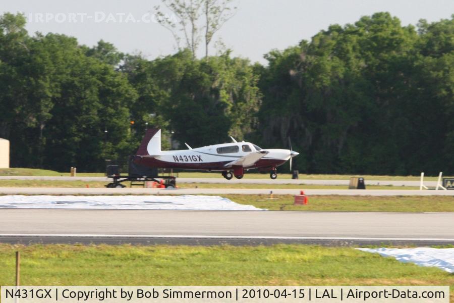 N431GX, 2006 Mooney M20R Ovation C/N 29-0431, Arriving at Lakeland, FL during Sun N Fun 2010.