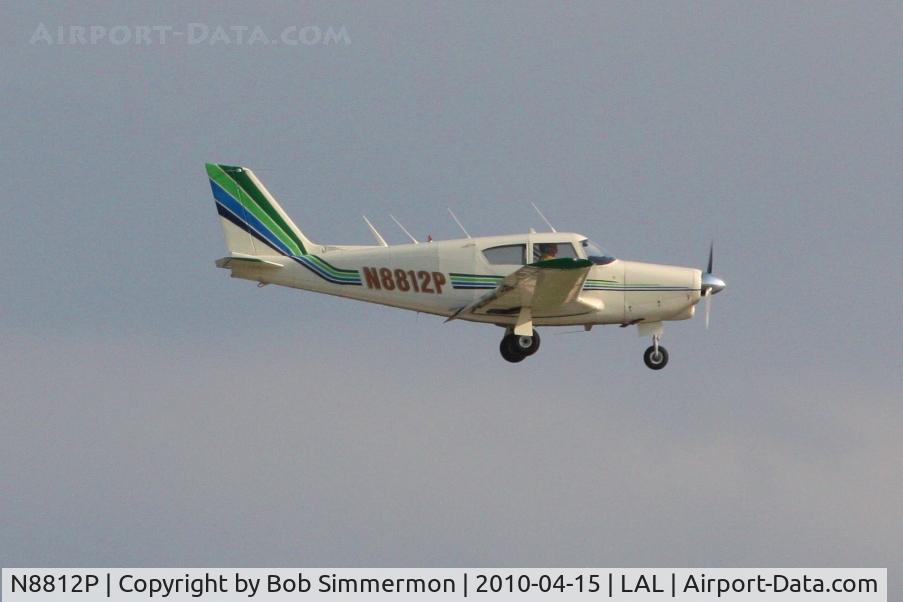 N8812P, 1965 Piper PA-24-260 C/N 24-4267, Arriving at Lakeland, FL during Sun N Fun 2010.
