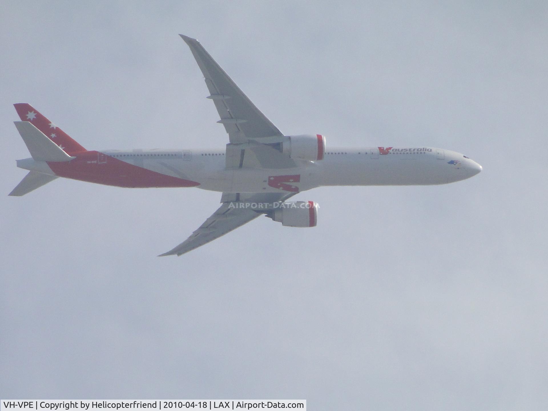 VH-VPE, 2009 Boeing 777-3ZG/ER C/N 37939, On final to LAX passing through Bell, Calif