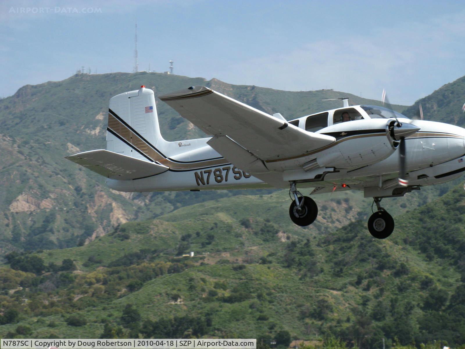 N787SC, 1962 Beech D50E Twin Bonanza C/N DH-324, 1962 Beech D50E TWIN BONANZA, two Lycoming GO-480-G2F6 295 Hp each, takeoff climb Rwy 22