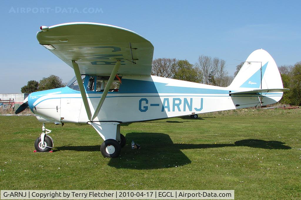 G-ARNJ, 1961 Piper PA-22-108 Colt Colt C/N 22-8587, at Fenland on a fine Spring day for the 2010 Vintage Aircraft Club Daffodil Fly-In