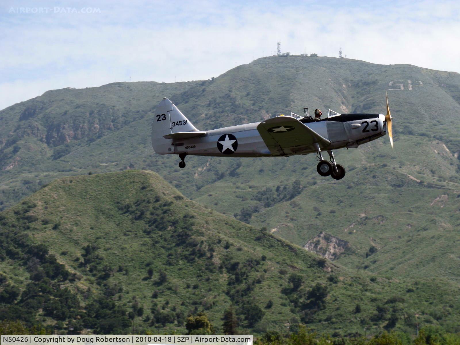 N50426, 1943 Fairchild M-62A-3 Cornell II C/N T43-5197, 1943 Fairchild M-62A CORNELL, Fairchild Ranger 6-440C-5 200 Hp inverted inline, takeoff climb Rwy 22