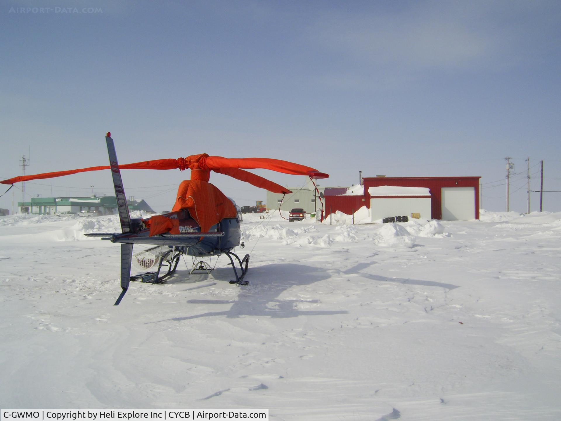 C-GWMO, 1985 Aerospatiale AS-350B Ecureuil C/N 1879, All dress with winter cover for a long night at Cambridge Bay airport