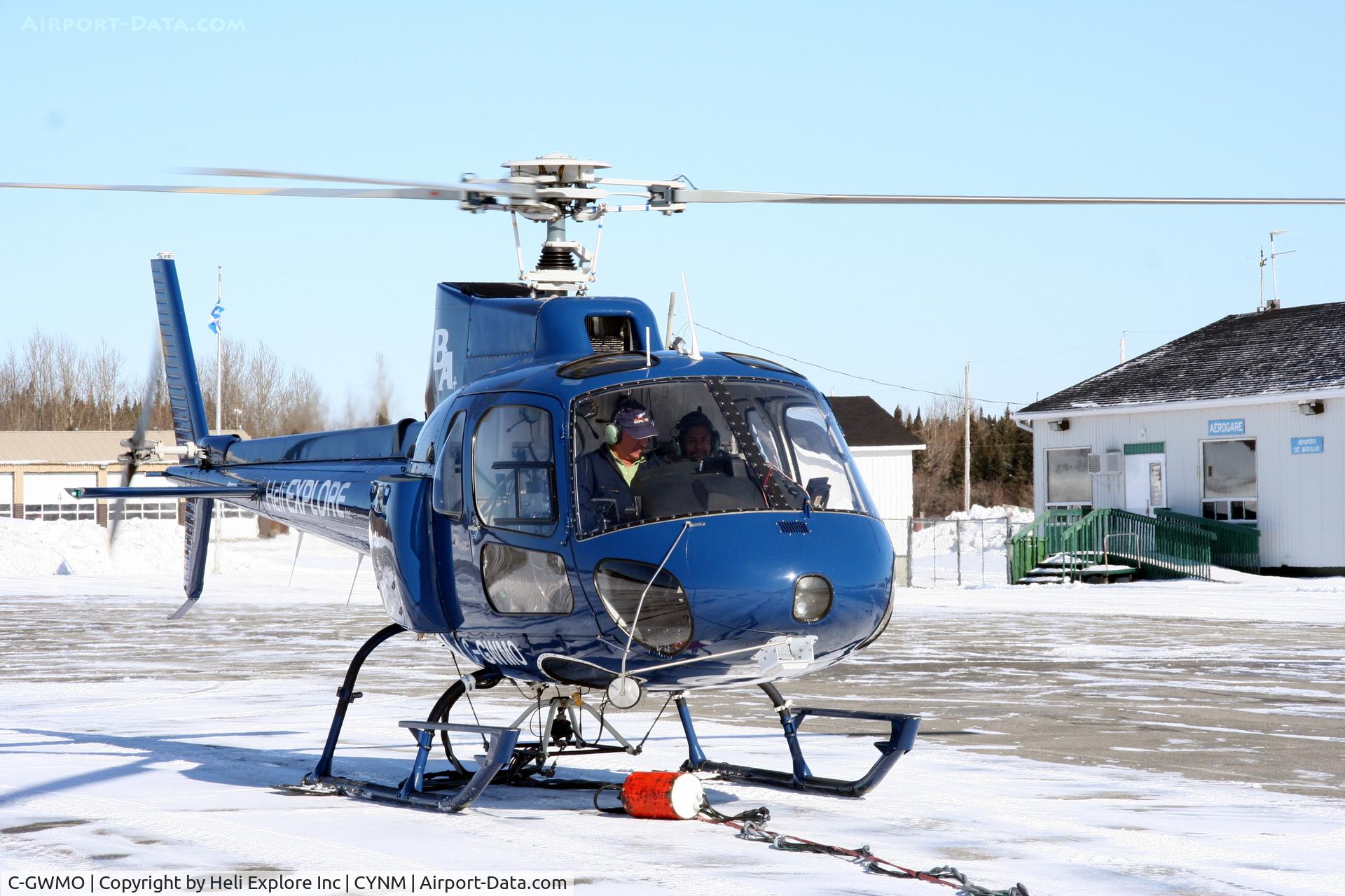 C-GWMO, 1985 Aerospatiale AS-350B Ecureuil C/N 1879, Heli Explore pilot Claude Noel getting ready for a airborne survey