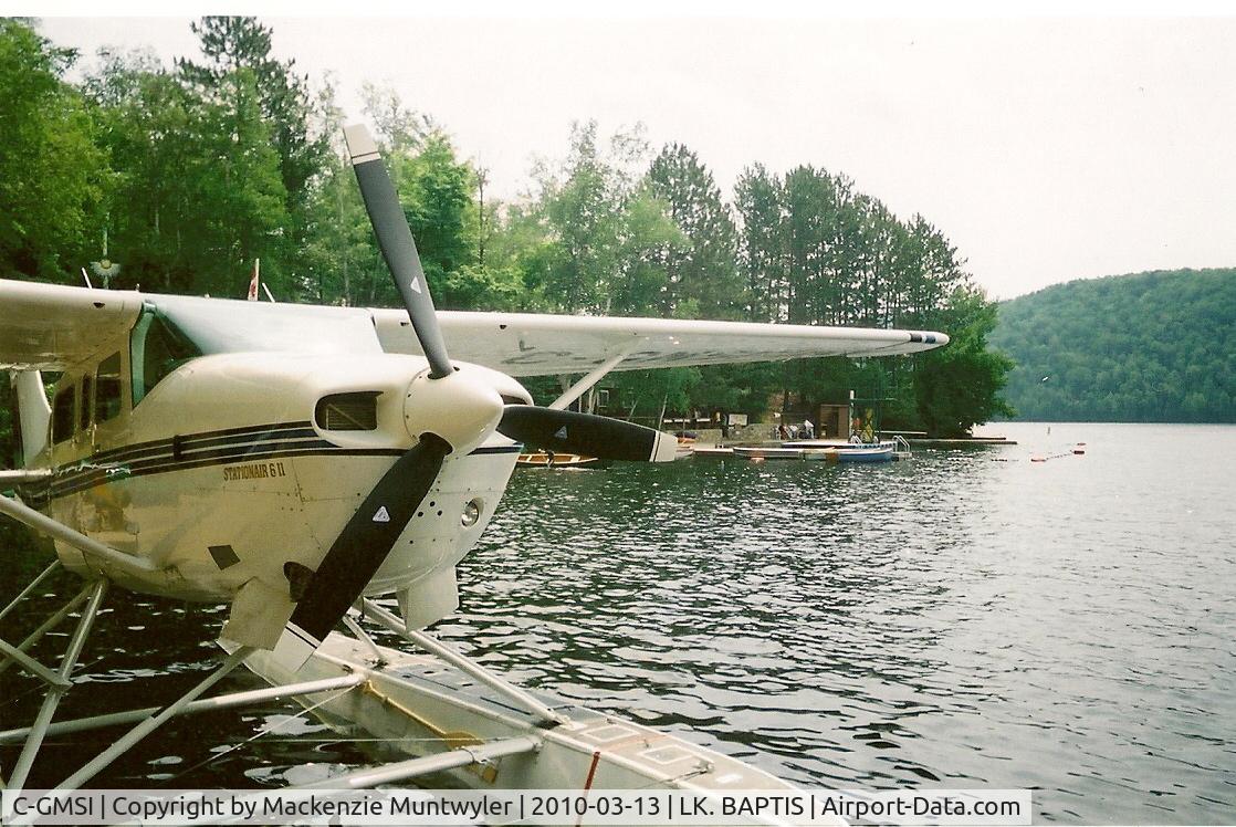 C-GMSI, 1982 Cessna TU206G Turbo Stationair C/N U20606656, C-GMSI sitting at a canoe dock on Lake Baptist, Ontario