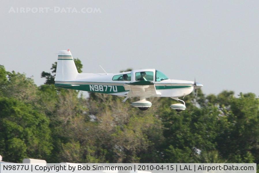 N9877U, 1976 Grumman American AA-5A Cheetah C/N AA5A0277, Arriving at Lakeland, FL during Sun N Fun 2010.