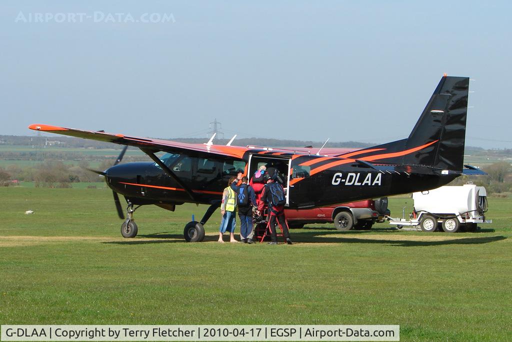 G-DLAA, 2003 Cessna 208 Caravan I C/N 20800367, Cessna Caravan loads up with skydivers on a pleasant day at Peterborough Sibson