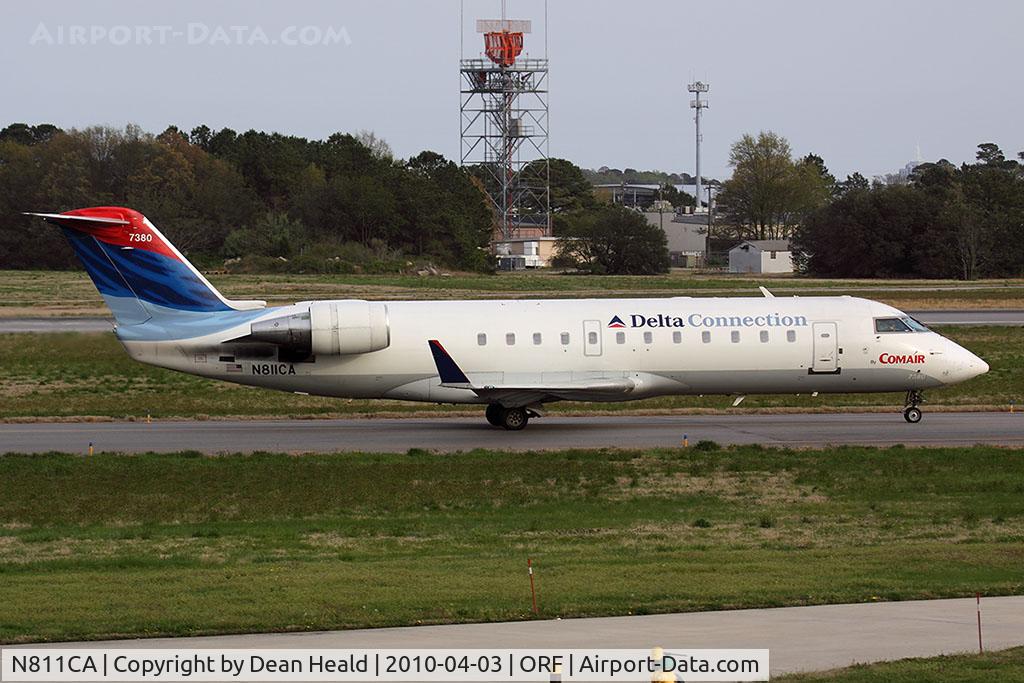 N811CA, 2000 Bombardier CRJ-100ER (CL-600-2B19) C/N 7380, Delta Connection (Comair) N811CA, originally bound for JFK, taxiing back to the gate.