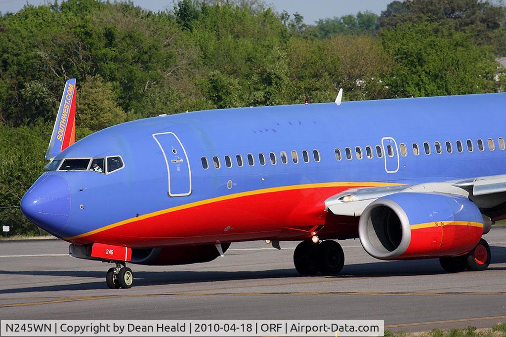 N245WN, 2006 Boeing 737-7H4 C/N 32506, Southwest Airlines N245WN (FLT SWA3760) exiting RWY 5 after arrival from Jacksonville Int'l (KJAX).