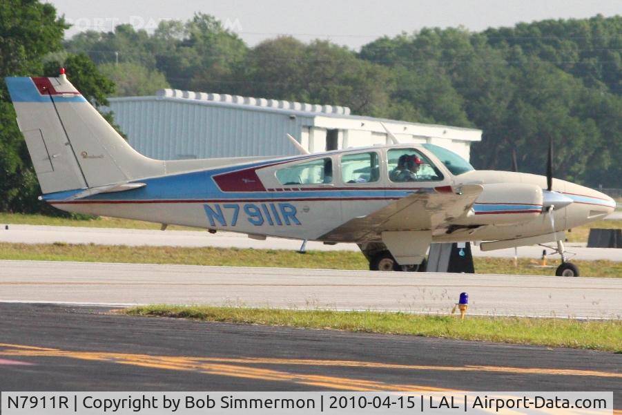 N7911R, 1968 Beech D55 Baron C/N TE-622, Departing Lakeland, FL during Sun N Fun 2010