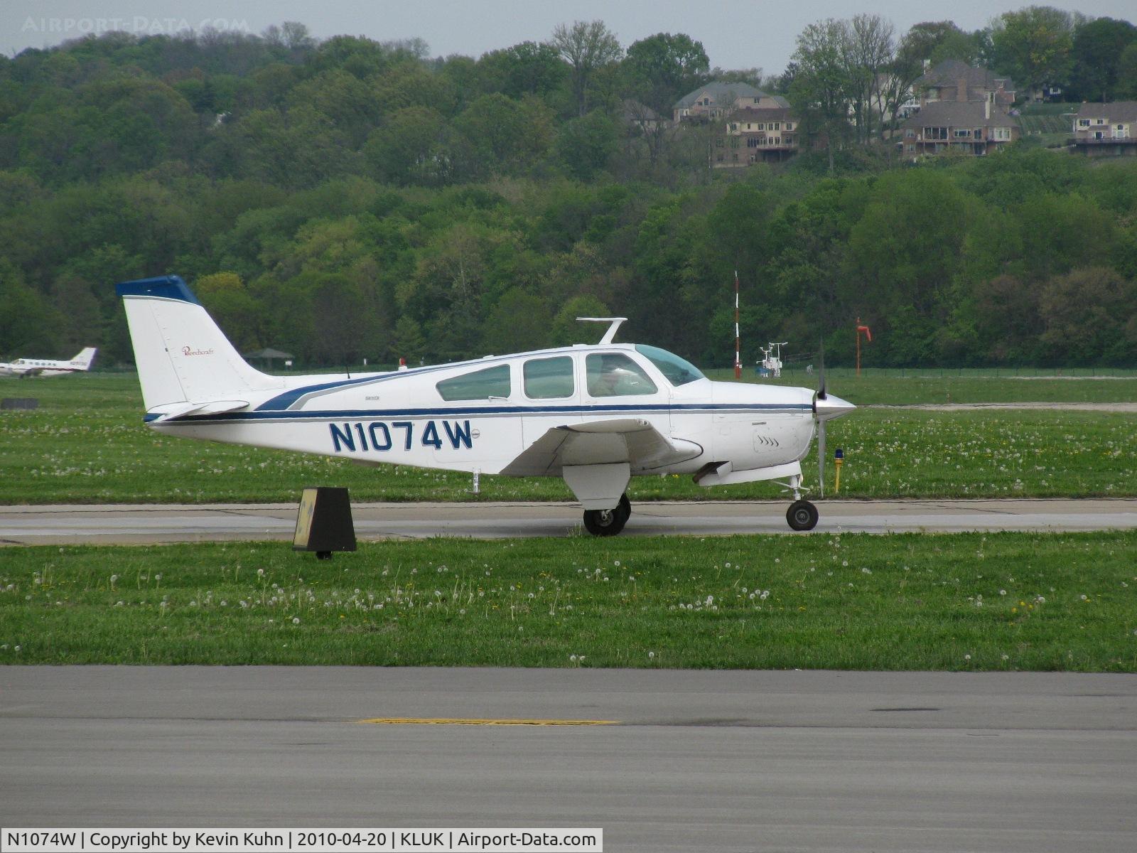 N1074W, 1973 Beech F33A Bonanza C/N CE-432, Holding before takeoff; N3923C on arrival in the background