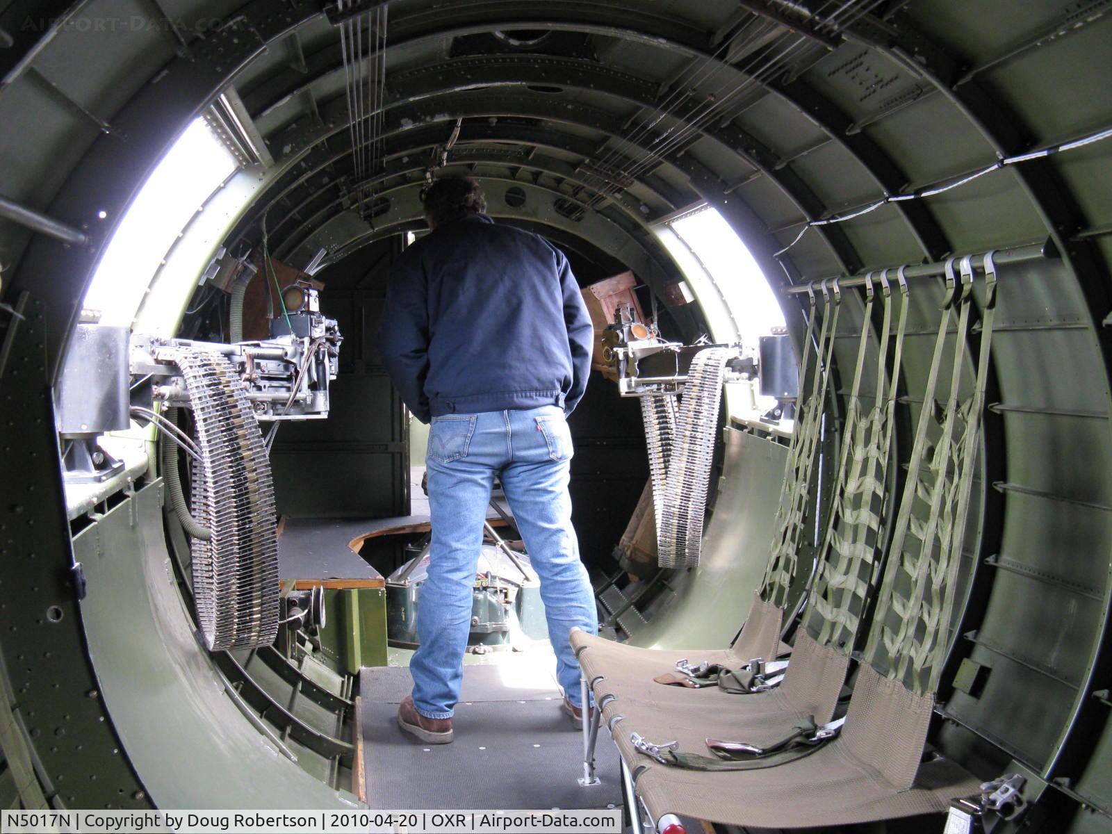 N5017N, 1944 Lockheed/Vega (Boeing) B-17G-105-VE Flying Fortress C/N 8649, 1944 Boeing B-17G Flying Fortress 'Aluminum Overcast' , waist machine guns-six foot man shows area size. Looking forward.