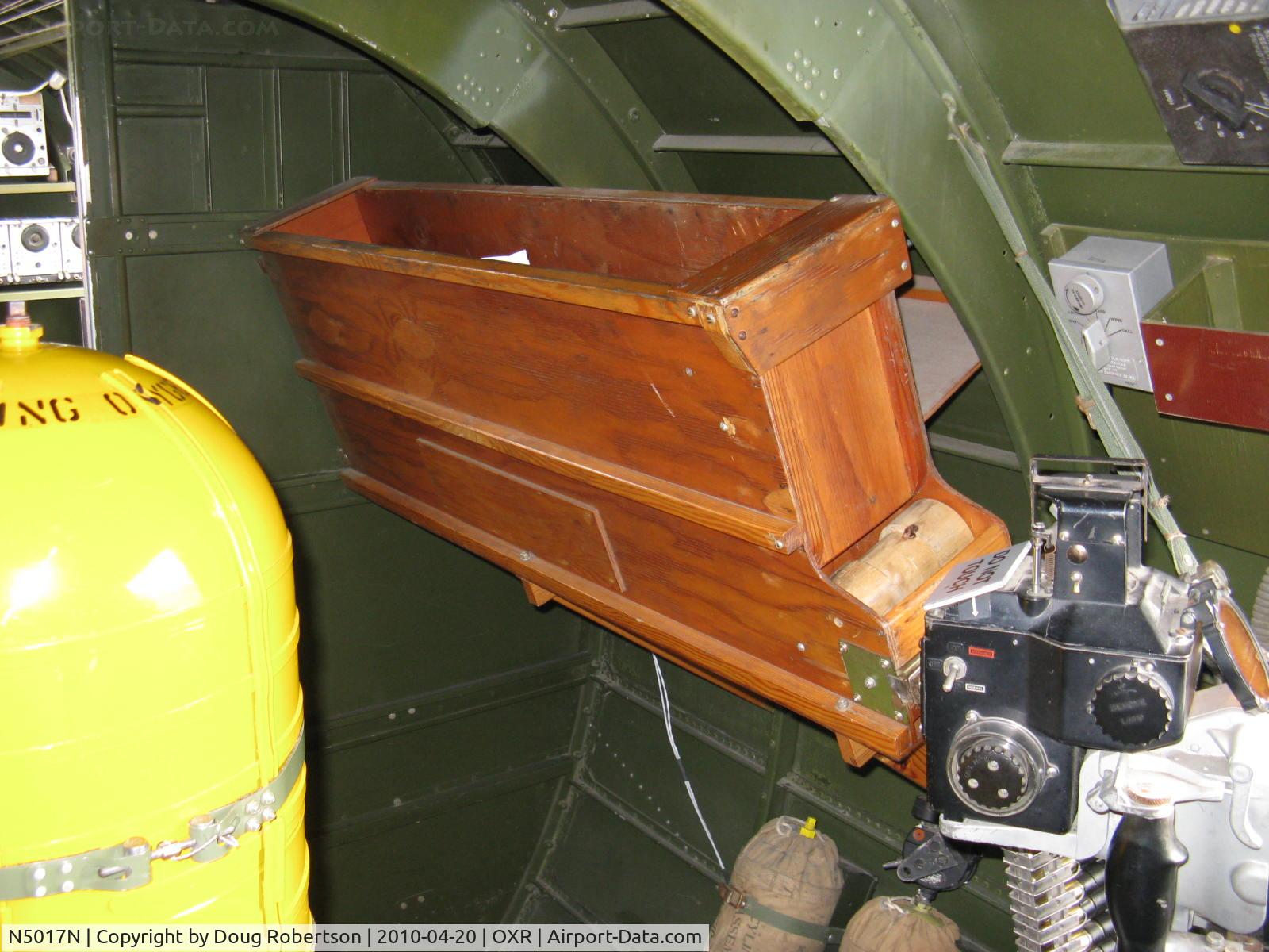 N5017N, 1944 Lockheed/Vega (Boeing) B-17G-105-VE Flying Fortress C/N 8649, 1944 Boeing B-17G Flying Fortress 'Aluminum Overcast' , 50 caliber machine gun ammo feed box to right waist gun. Yellow bottle is for aviator's breathing oxygen for ventral Sperry electric ball turret operator/gunner only.