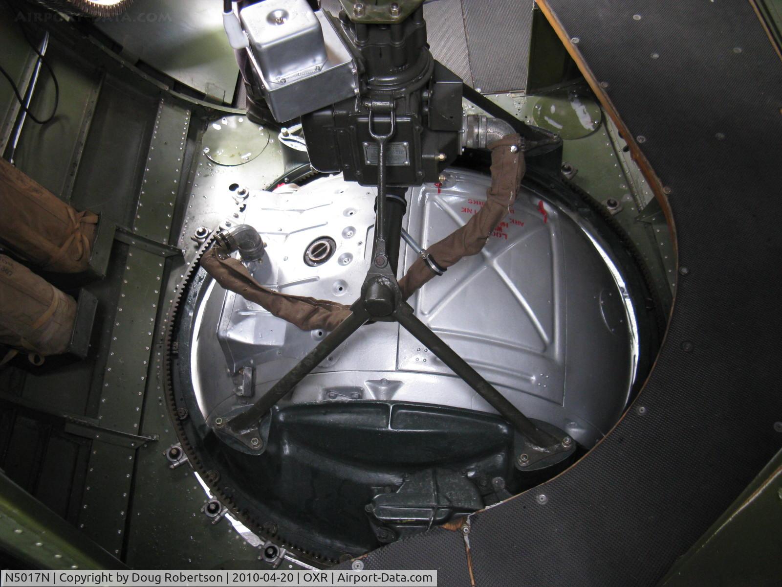 N5017N, 1944 Lockheed/Vega (Boeing) B-17G-105-VE Flying Fortress C/N 8649, 1944 Boeing B-17G Flying Fortress 'Aluminum Overcast', ventral guns Sperry electric ball turret-from aircraft interior looking downward.
