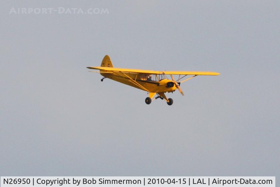 N26950, Piper J3C-65 Cub C/N 20974, Arriving at Lakeland, FL during Sun N Fun 2010.
