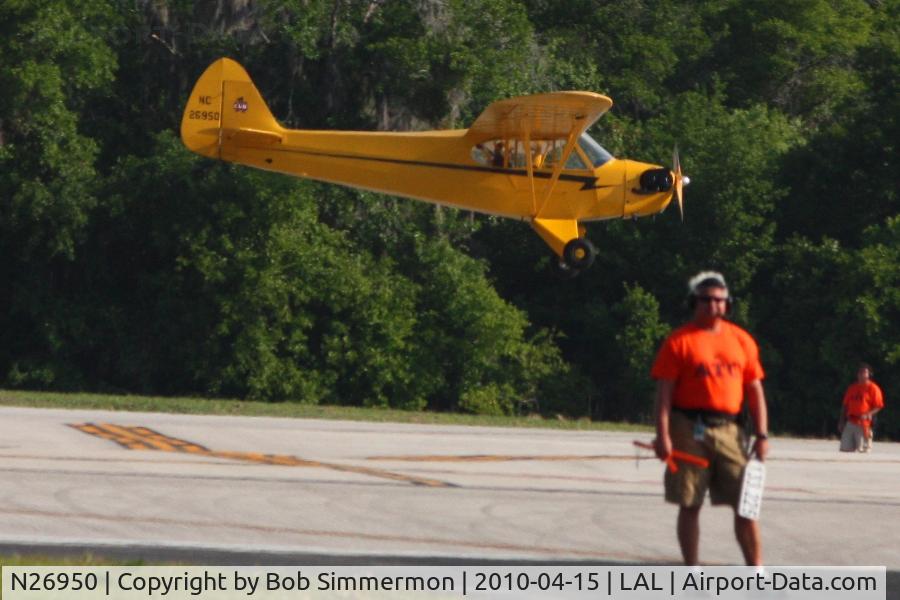 N26950, Piper J3C-65 Cub C/N 20974, Arriving at Lakeland, FL during Sun N Fun 2010.