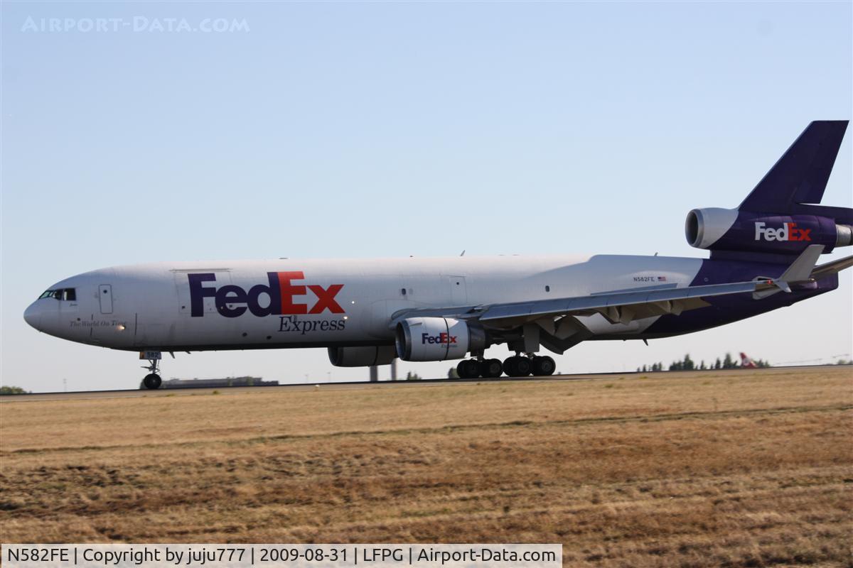 N582FE, 1991 McDonnell Douglas MD-11F C/N 48420, on landing at CDG