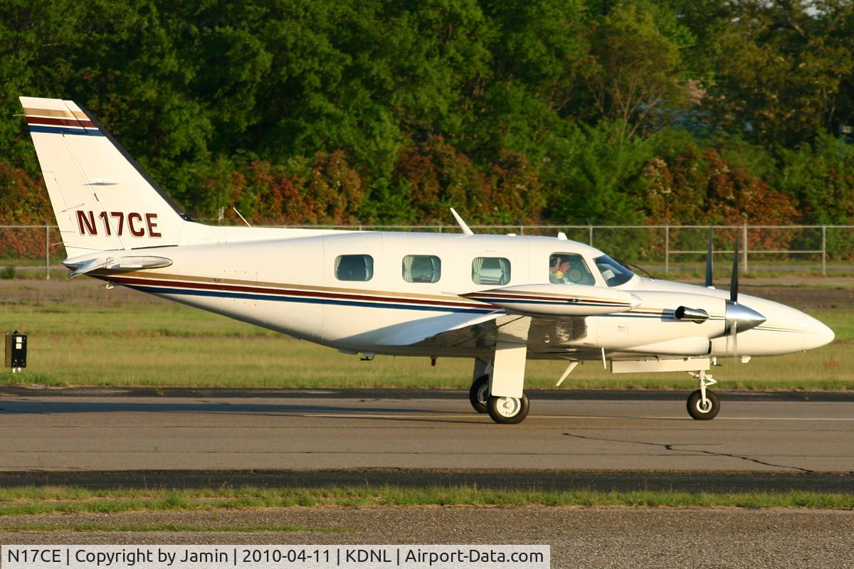 N17CE, 1978 Piper PA-31T1 Cheyenne 1 C/N 31T-7804007, Departing runway 23 at sunset.