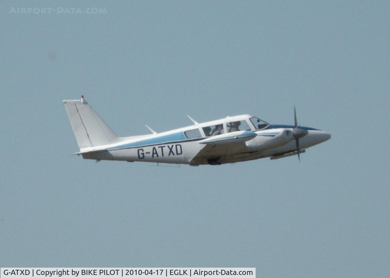 G-ATXD, 1966 Piper PA-30-160 B Twin Comanche C/N 30-1166, RESIDENT TWIN COMANCHE CLIMBING OUT FROM RWY 07