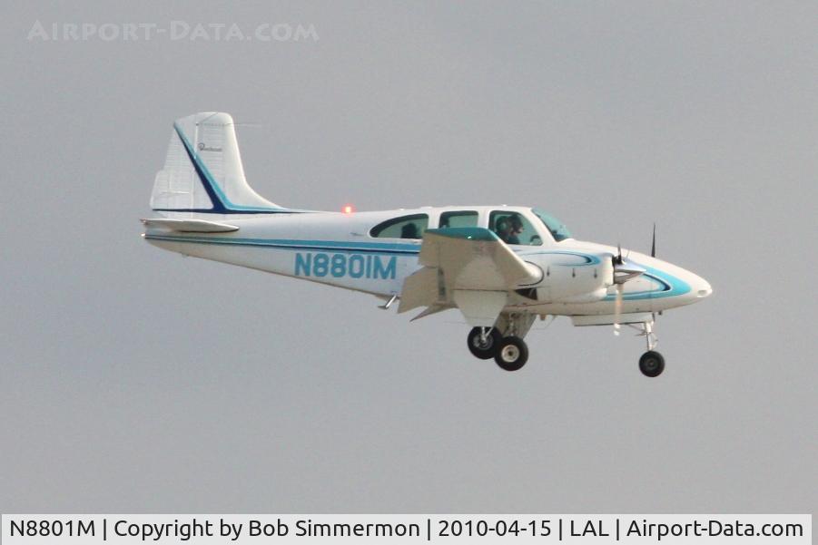 N8801M, 1964 Beech D95A Travel Air C/N TD-569, Arriving at Lakeland, FL during Sun N Fun 2010.
