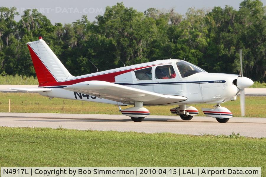 N4917L, 1967 Piper PA-28-180 C/N 28-4282, Departing Lakeland, FL during Sun N Fun 2010
