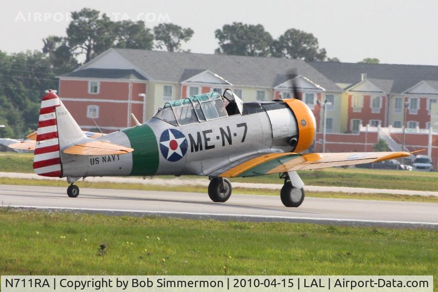 N711RA, 1943 North American SNJ-5C Texan Texan C/N 88-14800, Departing Lakeland, FL during Sun N Fun 2010