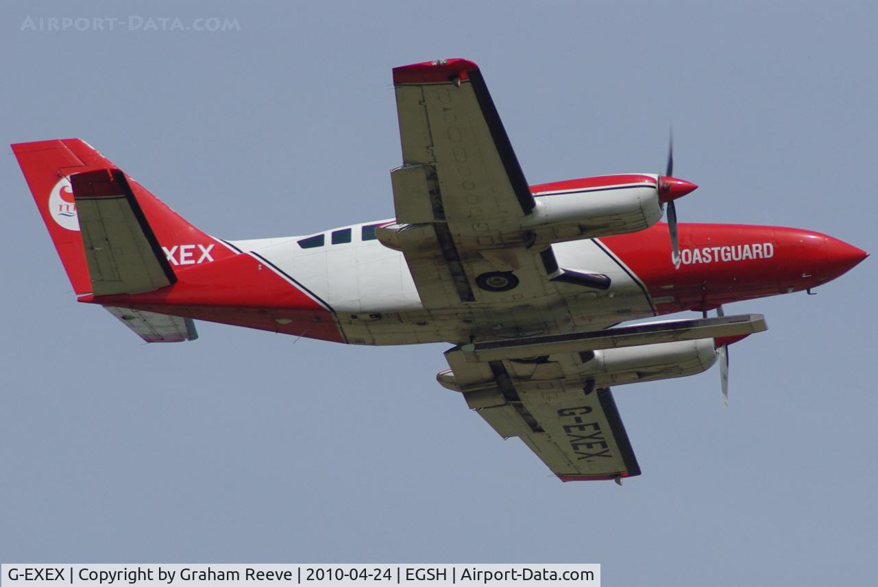 G-EXEX, 1977 Cessna 404 Titan C/N 404-0037, HM Coastguard taking off from Norwich.