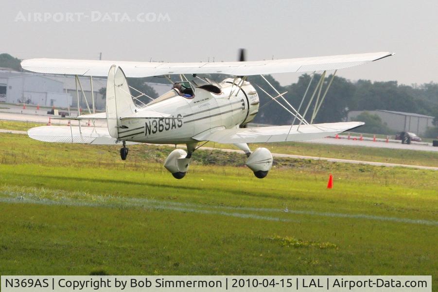 N369AS, 1992 Classic Aircraft Corp WACO YMF C/N F5C-046, Landing in the grass at Lakeland, FL during Sun N Fun 2010.