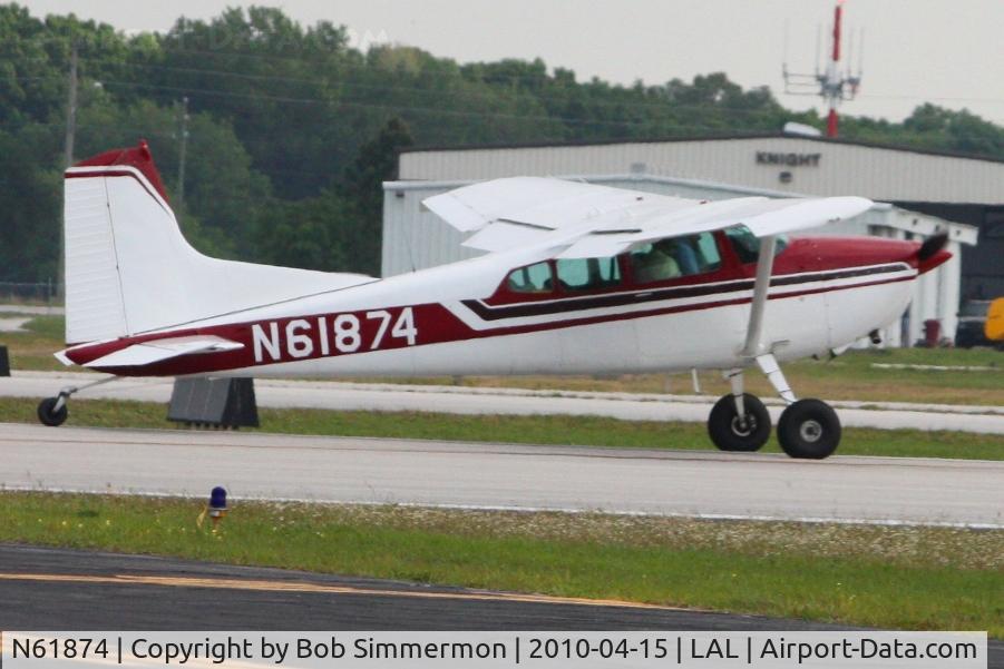 N61874, 1977 Cessna 180K Skywagon C/N 18052809, Departing Lakeland, FL during Sun N Fun 2010