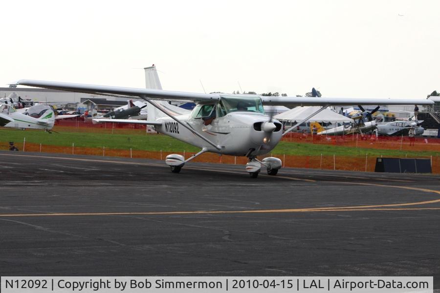 N12092, 1973 Cessna 172M C/N 17261802, Departing Lakeland, FL during Sun N Fun 2010