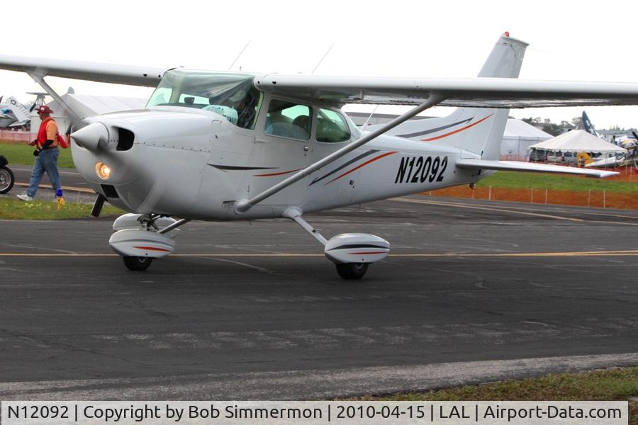 N12092, 1973 Cessna 172M C/N 17261802, Departing Lakeland, FL during Sun N Fun 2010