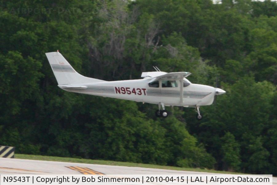 N9543T, 1960 Cessna 210 C/N 57343, Departing Lakeland, FL during Sun N Fun 2010