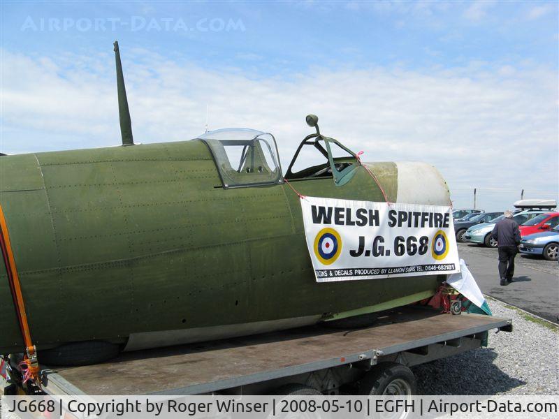 JG668, 1944 Supermarine 361 Spitfire LF.VIII C/N Not found JG668, Spitfire VIII fuselage on display at a fund raising visit to Swansea Airport. Carried the s/n 58-411 in RAAF service. Became an exhibit at the Welsh Spitfire Museum at Haverfordwest Airport and  registered G-CFGA on 5 January 2009.