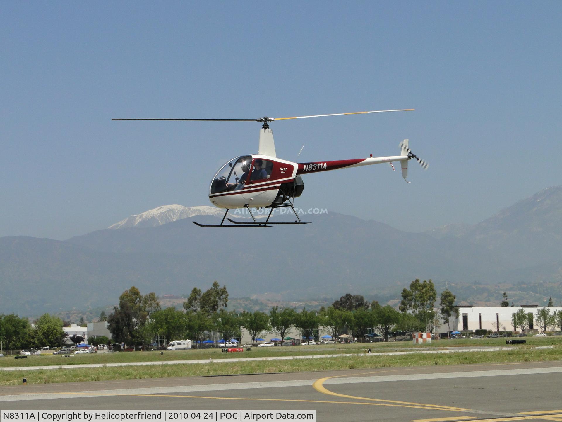 N8311A, 1994 Robinson R22 Beta C/N 2442, Air taxiing to westside helipads