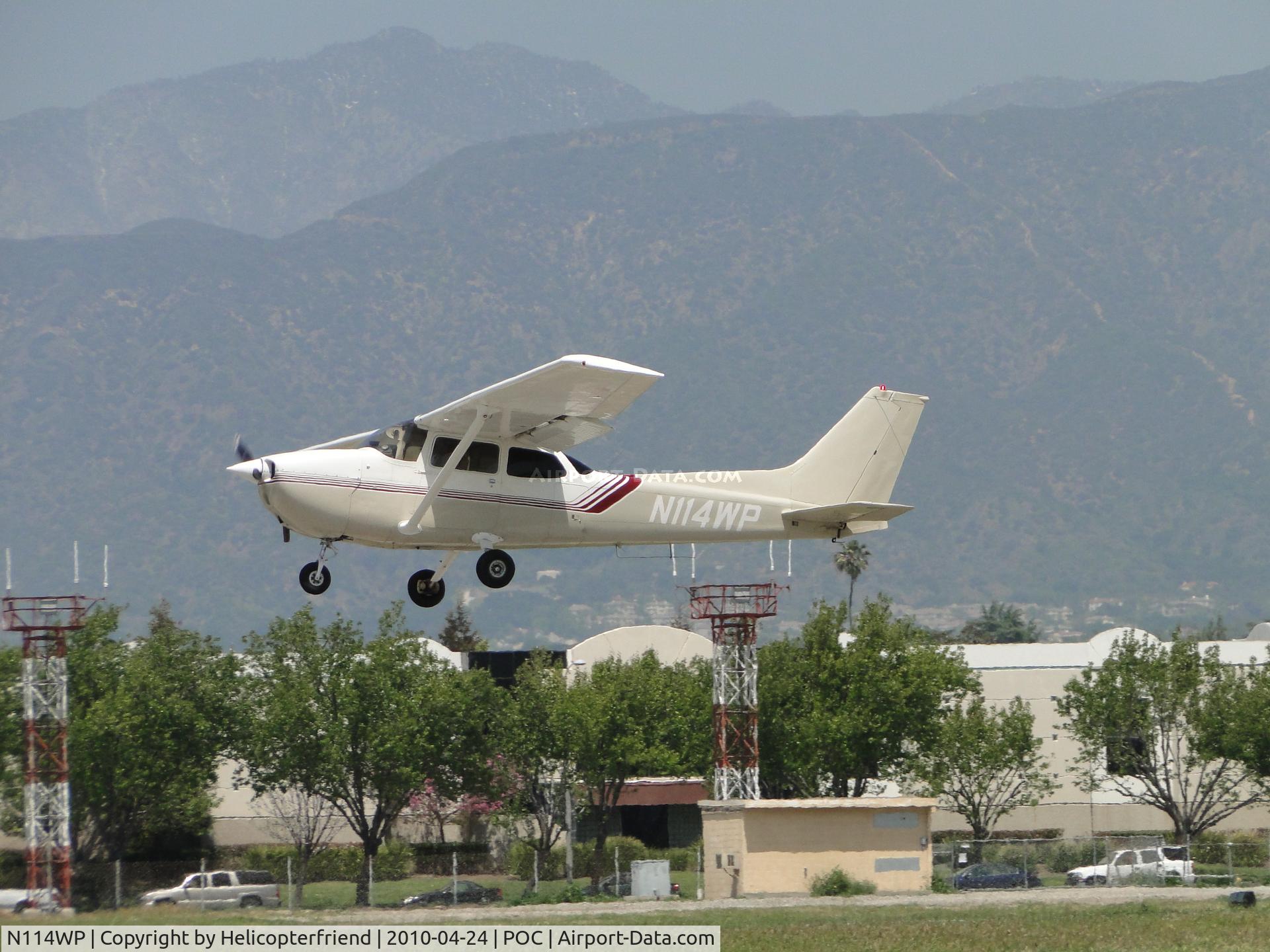N114WP, 1976 Cessna 172N C/N 17267603, Power on fly by of runway 26L