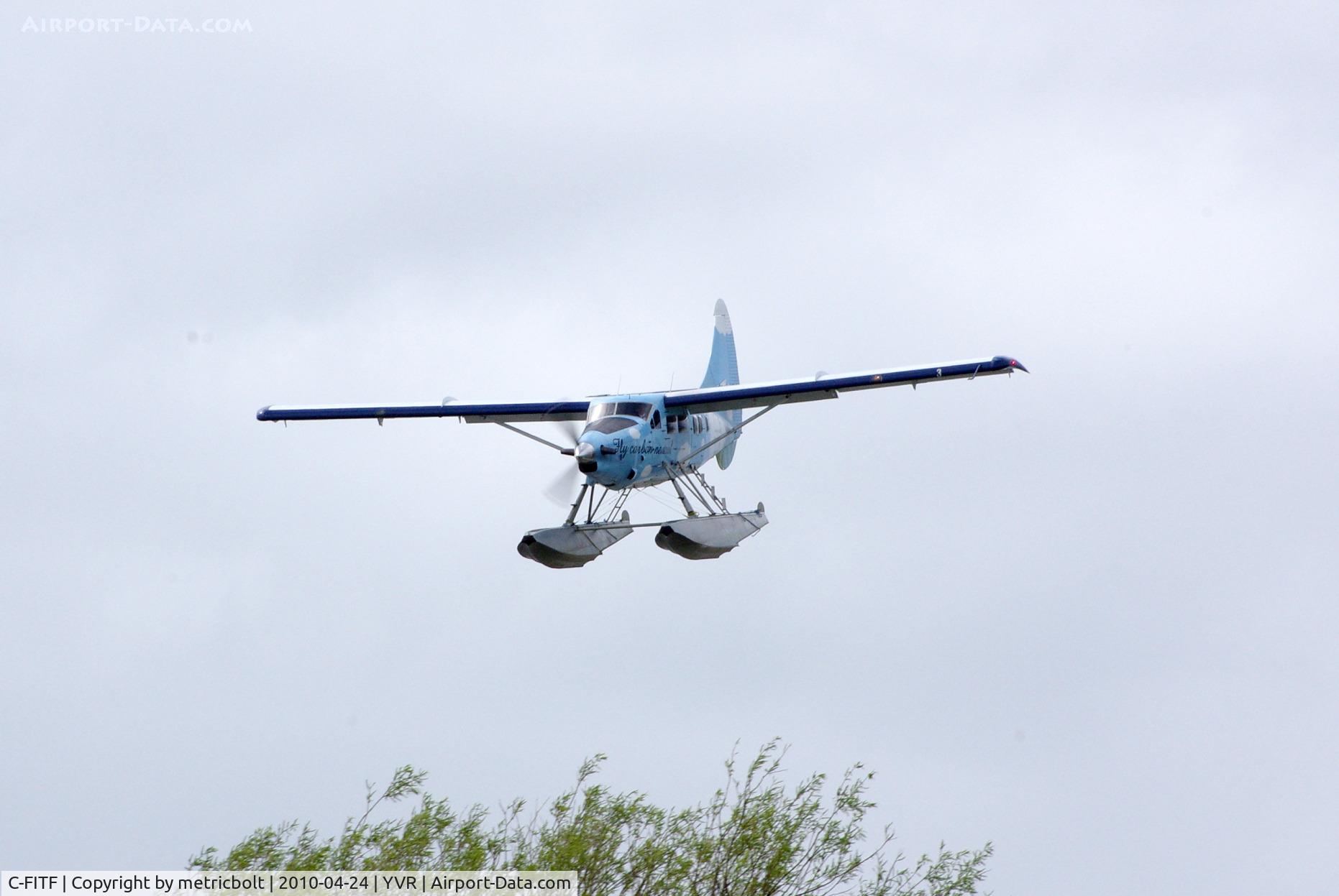 C-FITF, 1955 De Havilland Canada DHC-3T Vazar Turbine Otter C/N 89, landing on the Fraser River