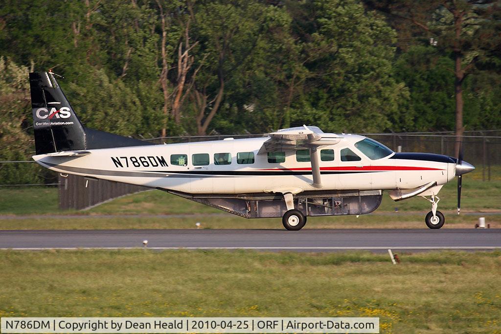 N786DM, 2001 Cessna 208B Grand Caravan C/N 208B0922, Certified Aviation Services 2001 Cessna 208B Grand Caravan N786DM starting takeoff roll on RWY 23 from intersection Foxtrot. Looking closely, the guy in the back also has a control stick. Interesting to note is the clear cargo hold and it's contents.