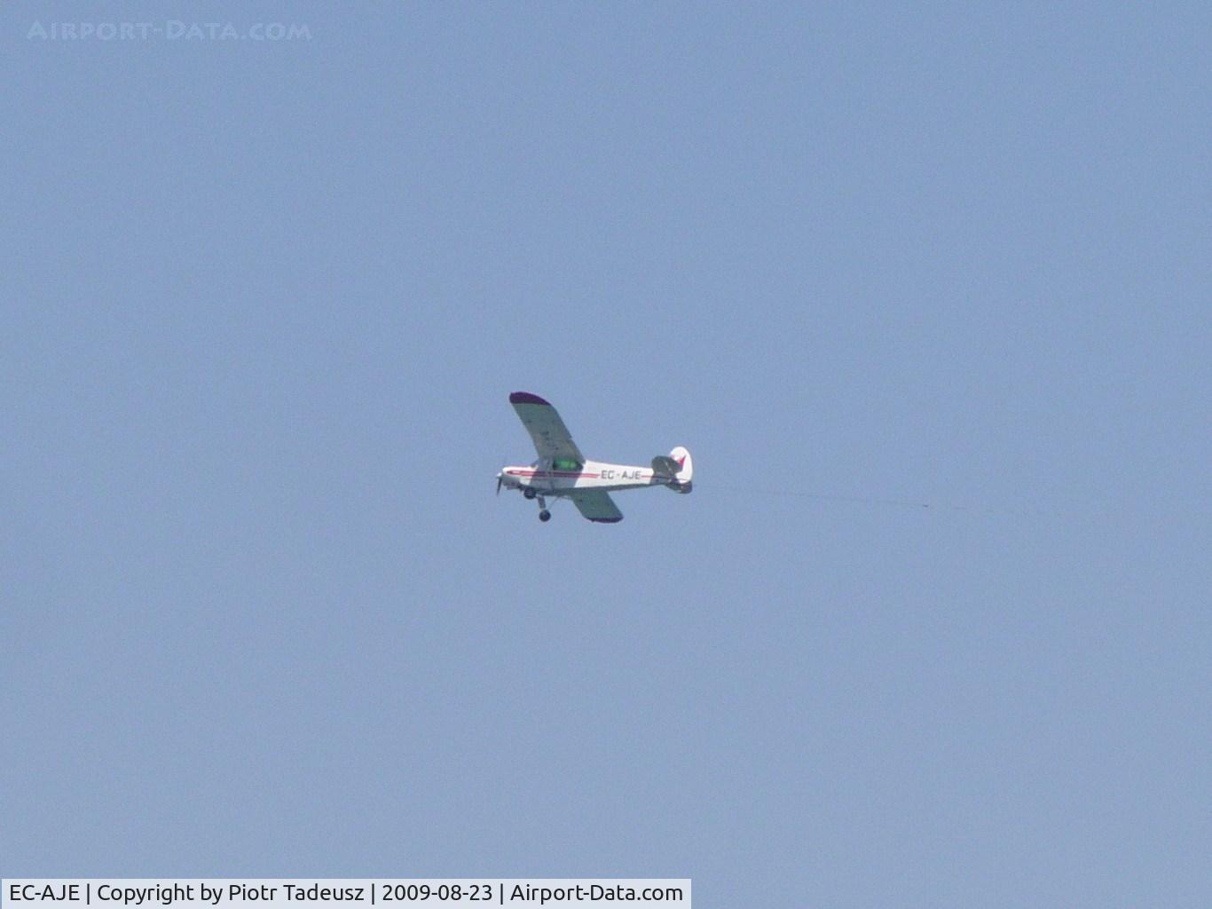 EC-AJE, 1953 Piper PA-18-135 Super Cub Super Cub C/N 18-2935, piper towing a advertising banner over Fuengirola Beach