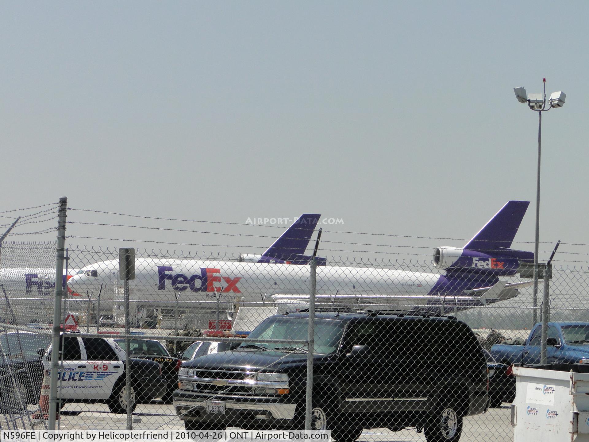 N596FE, 1993 McDonnell Douglas MD-11F C/N 48554, Parked behind FED EX bldg at ONT near the Airport Police parking area
