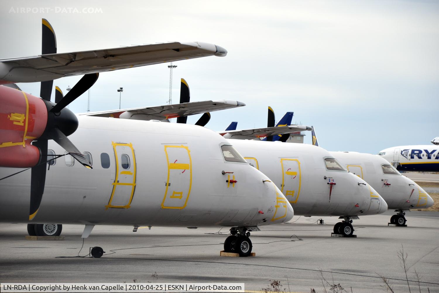 LN-RDA, 1999 De Havilland Canada DHC-8-402Q Dash 8 C/N 4013, SAS Commuter Dash 8 400s at Nyköping Skavsta airport in Sweden. These are LN-RDA (in front), LN-RDT and LN-RDP, which are in storage after being taken out of service by SAS after a series of main landing gear collapses.
