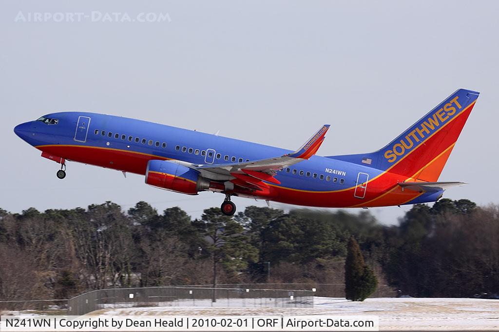 N241WN, 2006 Boeing 737-7H4 C/N 32504, Southwest Airlines N241WN departing RWY 5 with a significant snow on the ground by Norfolk's standards.