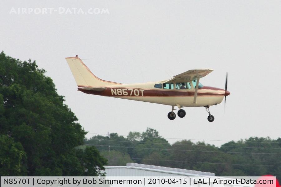 N8570T, 1959 Cessna 182C Skylane C/N 52470, Arriving at Lakeland, FL during Sun N Fun 2010.
