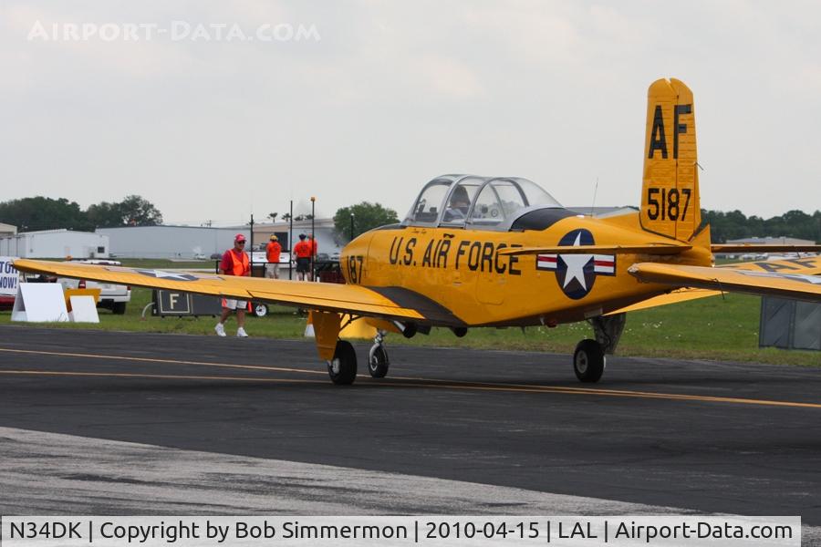 N34DK, 1962 Beech A45 C/N G-744, Departing Lakeland, FL during Sun N Fun 2010